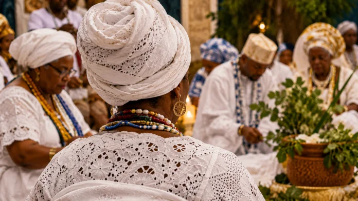 Representação de uma comunidade de matriz africana reunida em cerimônia religiosa, com vestimentas brancas e elementos tradicionais.